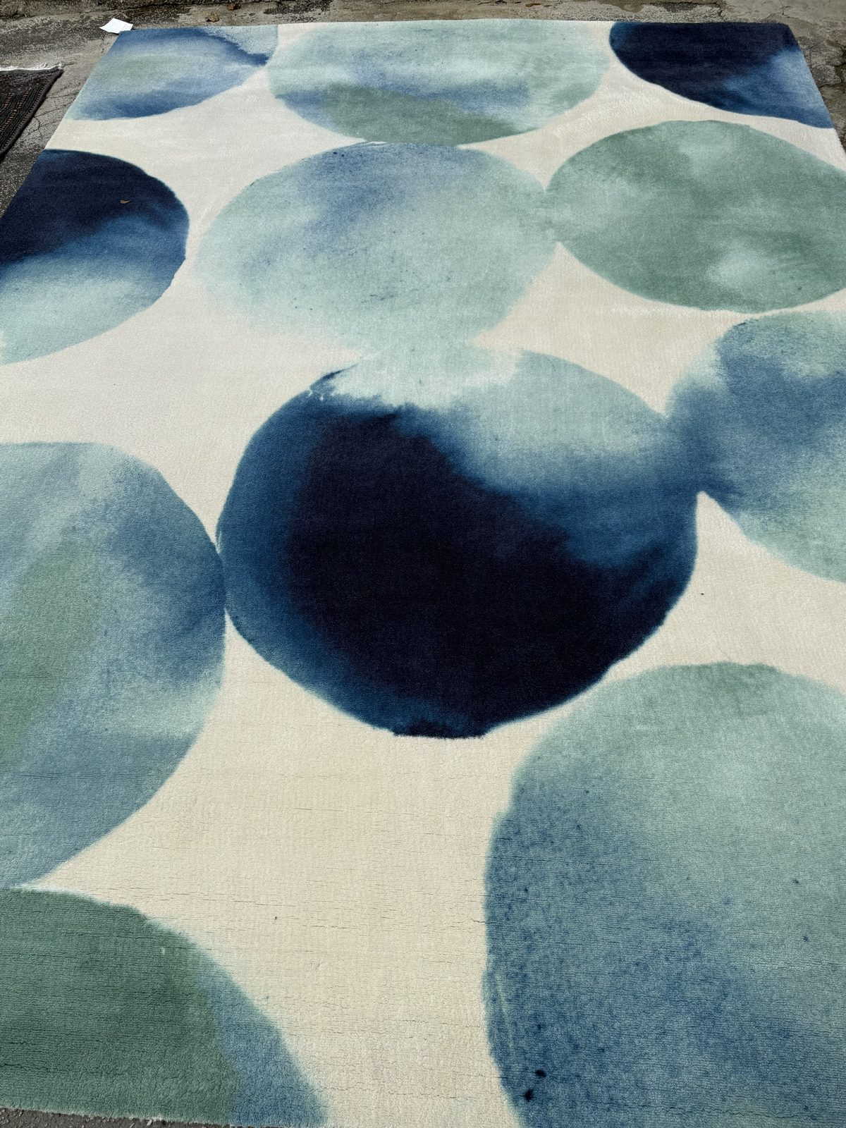 Blue and green watercolor circle rug after cleaning, ivory field bright and colors vivid